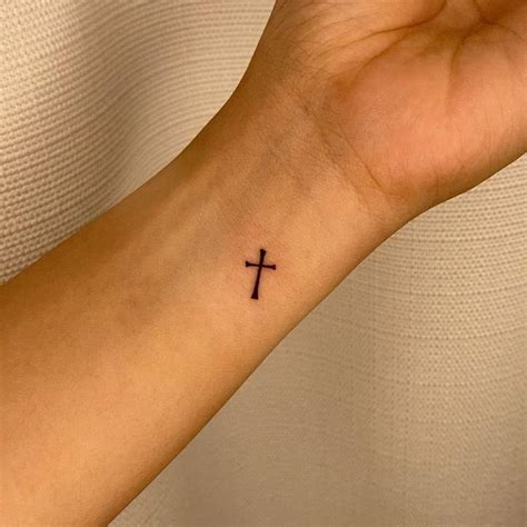 tattoo simple cross|minimalist cross tattoo wrist.